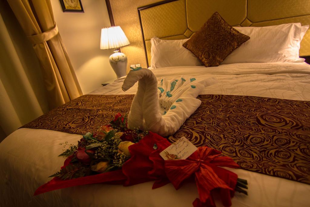 Rest Night Serviced Apartments- Alhamra Ер-Ріяд Номер фото A towel swan