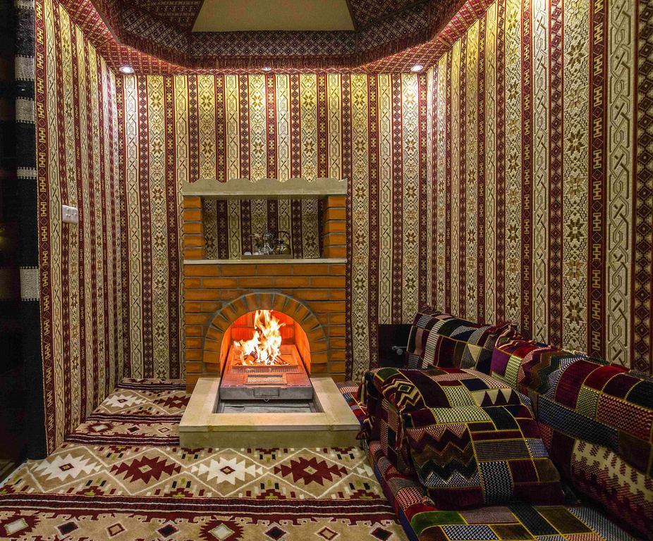 Rest Night Serviced Apartments- Alhamra Ер-Ріяд Екстер'єр фото A majlis with a fireplace