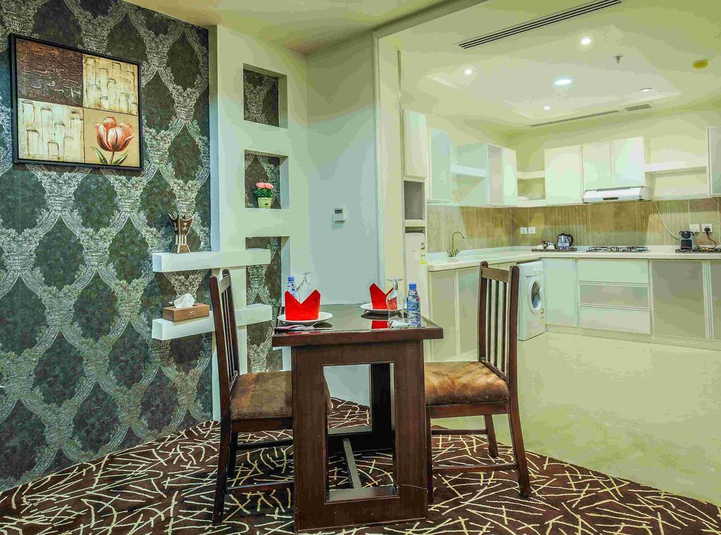 Rest Night Serviced Apartments- Alhamra Ер-Ріяд Екстер'єр фото A kitchen in a hotel suite